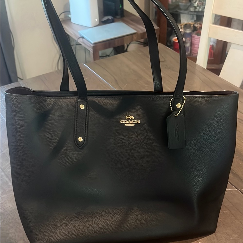 Coach Black Tote with Gold Hardware and Structured Design